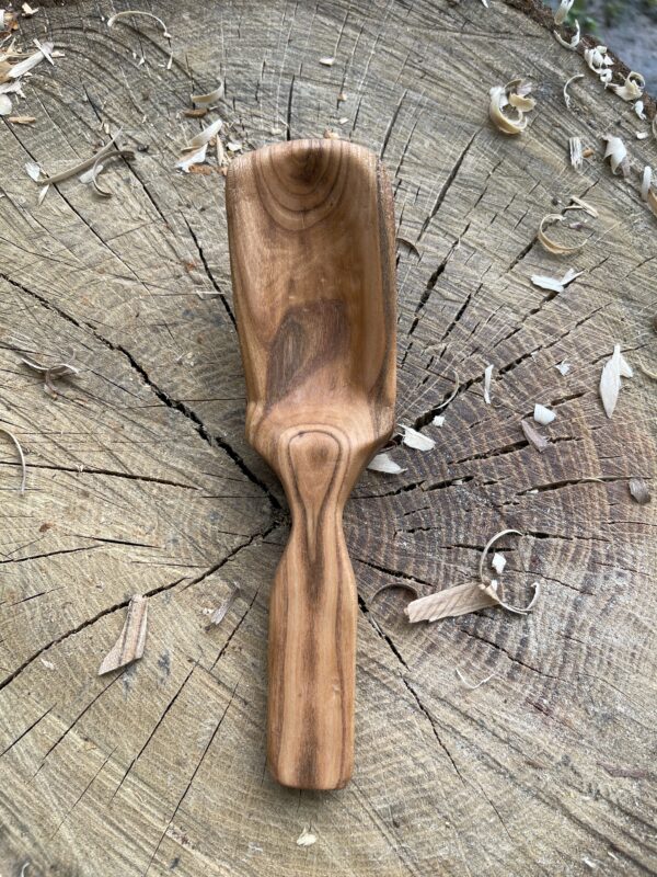 Peach scoop hand-carved