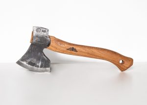 Hand-forged Gränsfors Small Carving Axe with its vegetable-tanned leather sheath, ideal for sloyd and spoon carving.