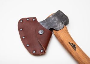 Gränsfors Bruk Medium Carving Axe with a vegetable-tanned leather sheath, designed for power and precision in wood carving and sloyd.