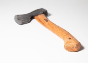 Gränsfors Bruk Medium Carving Axe with a vegetable-tanned leather sheath, designed for power and precision in wood carving and sloyd.